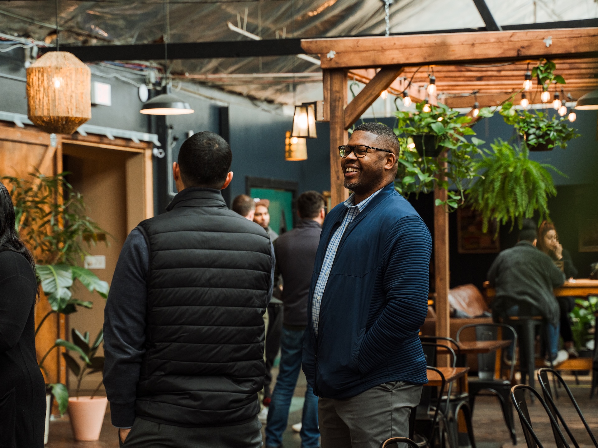 A lively evening gathering at Earth Coffeehouse